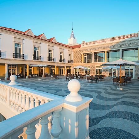 Praia D'El Rey Marriott Golf & Beach Resort Praia del Rei Bagian luar foto The central courtyard of the hotel
